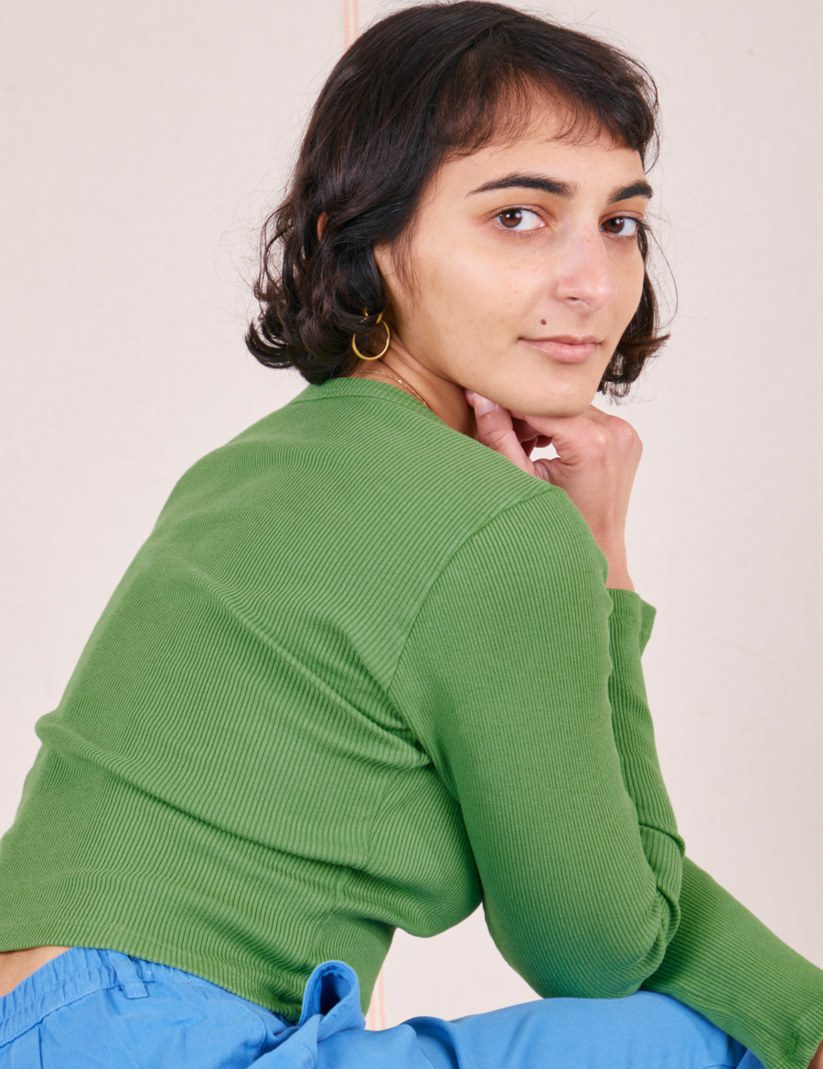 Side view of Long Sleeve V-Neck Tee in Bright Olive worn by Soraya