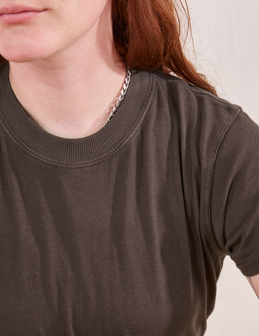 The Organic Vintage Tee in Espresso Brown close up on Alex