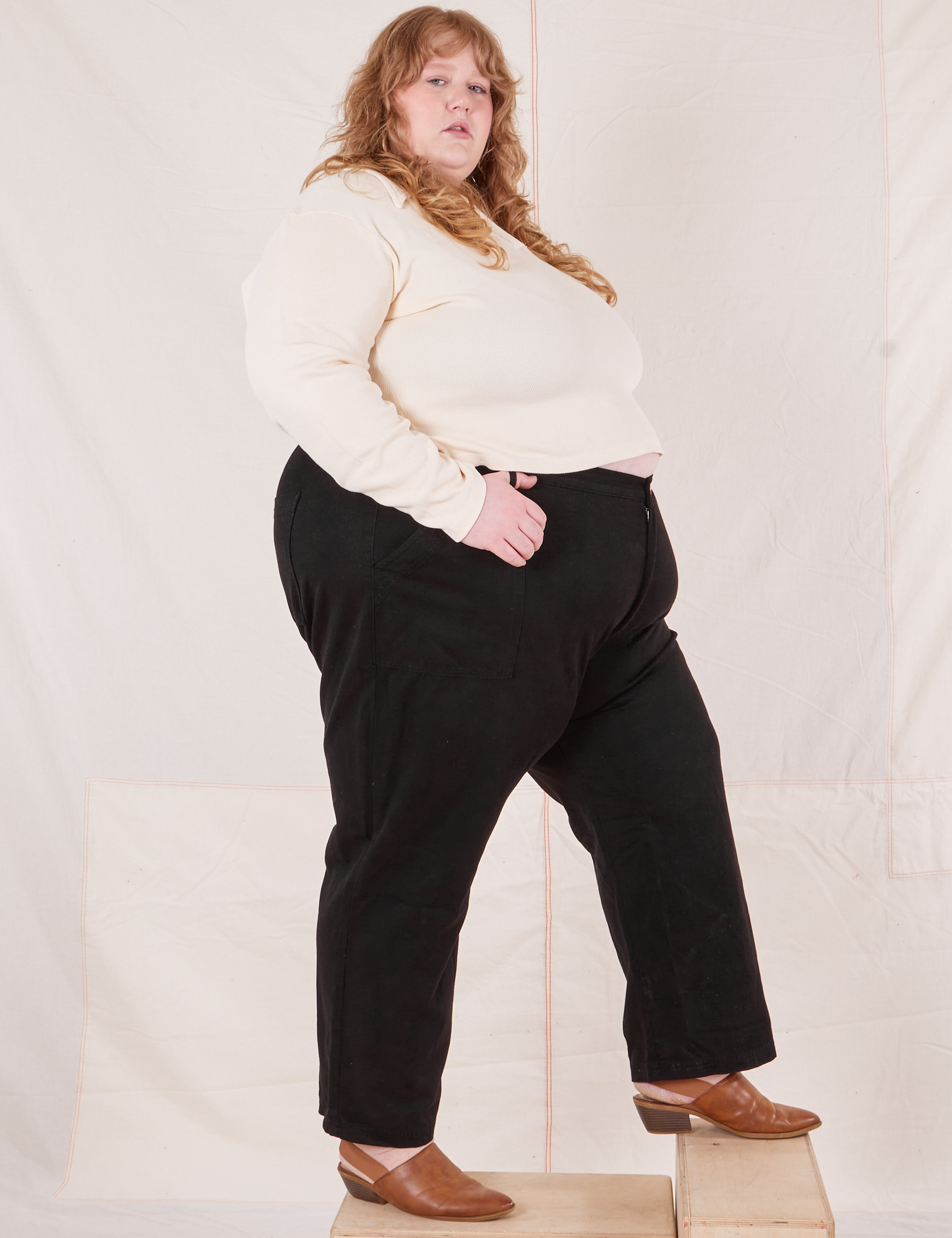 Side view of Organic Work Pants in Basic Black worn by Catie