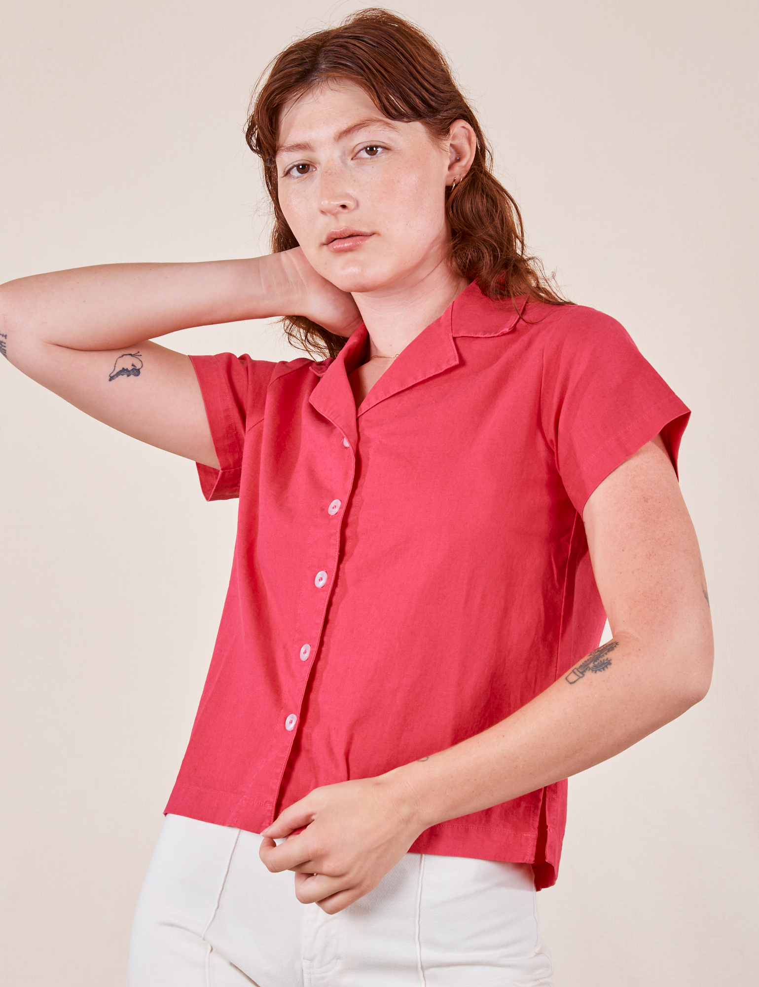 Alex is wearing Pantry Button-Up in Hot Pink