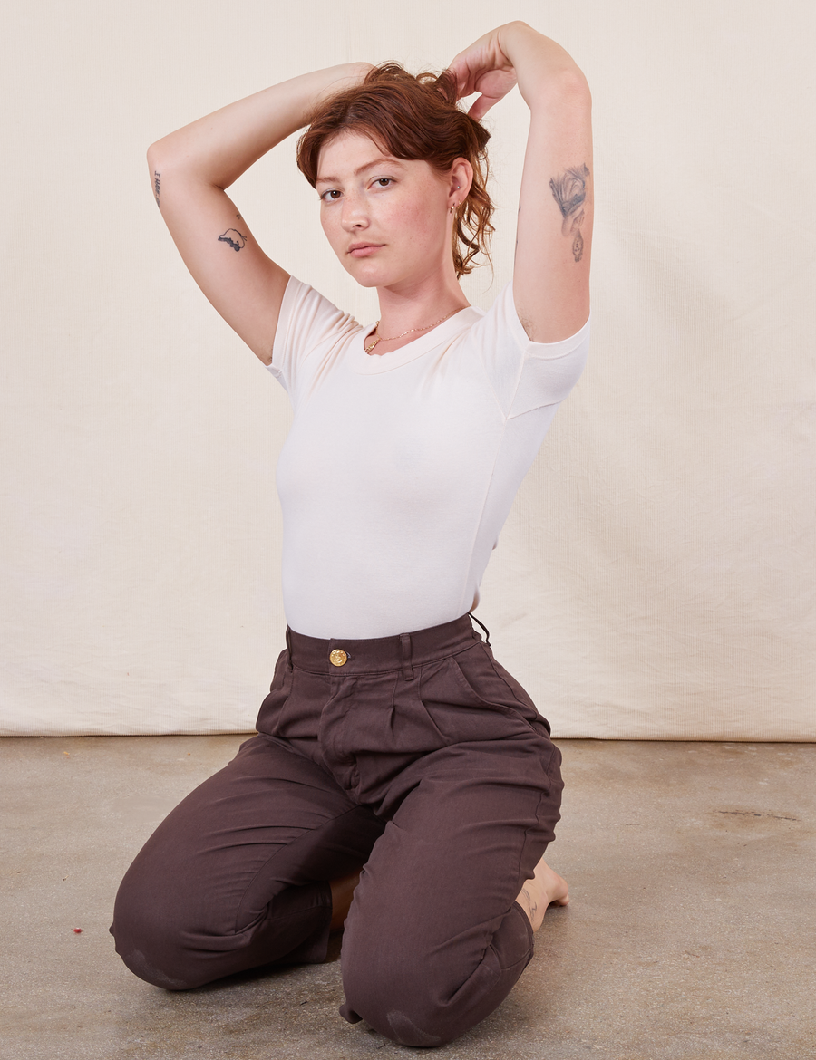 Alex is wearing Baby Tee in Vintage Tee White