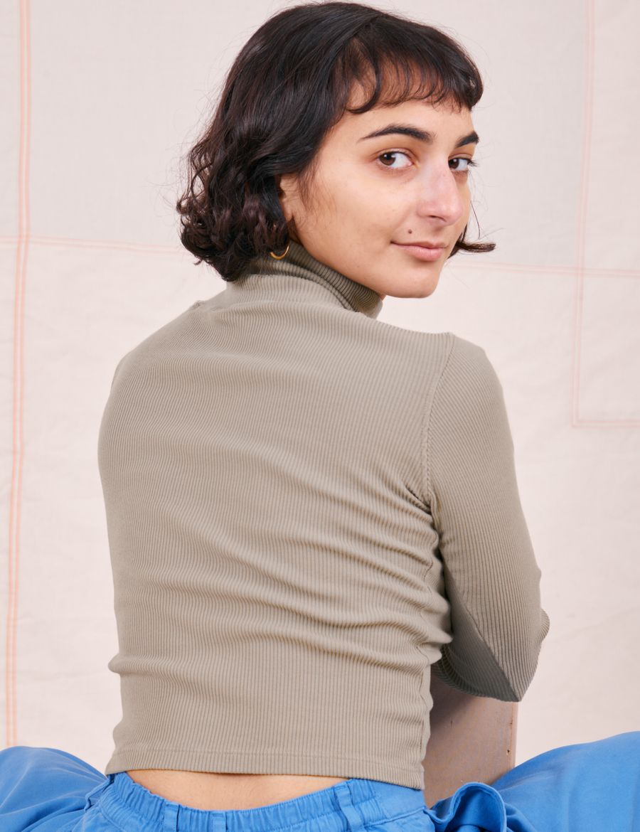 Back view of Essential Turtleneck in Khaki Grey worn by Soraya