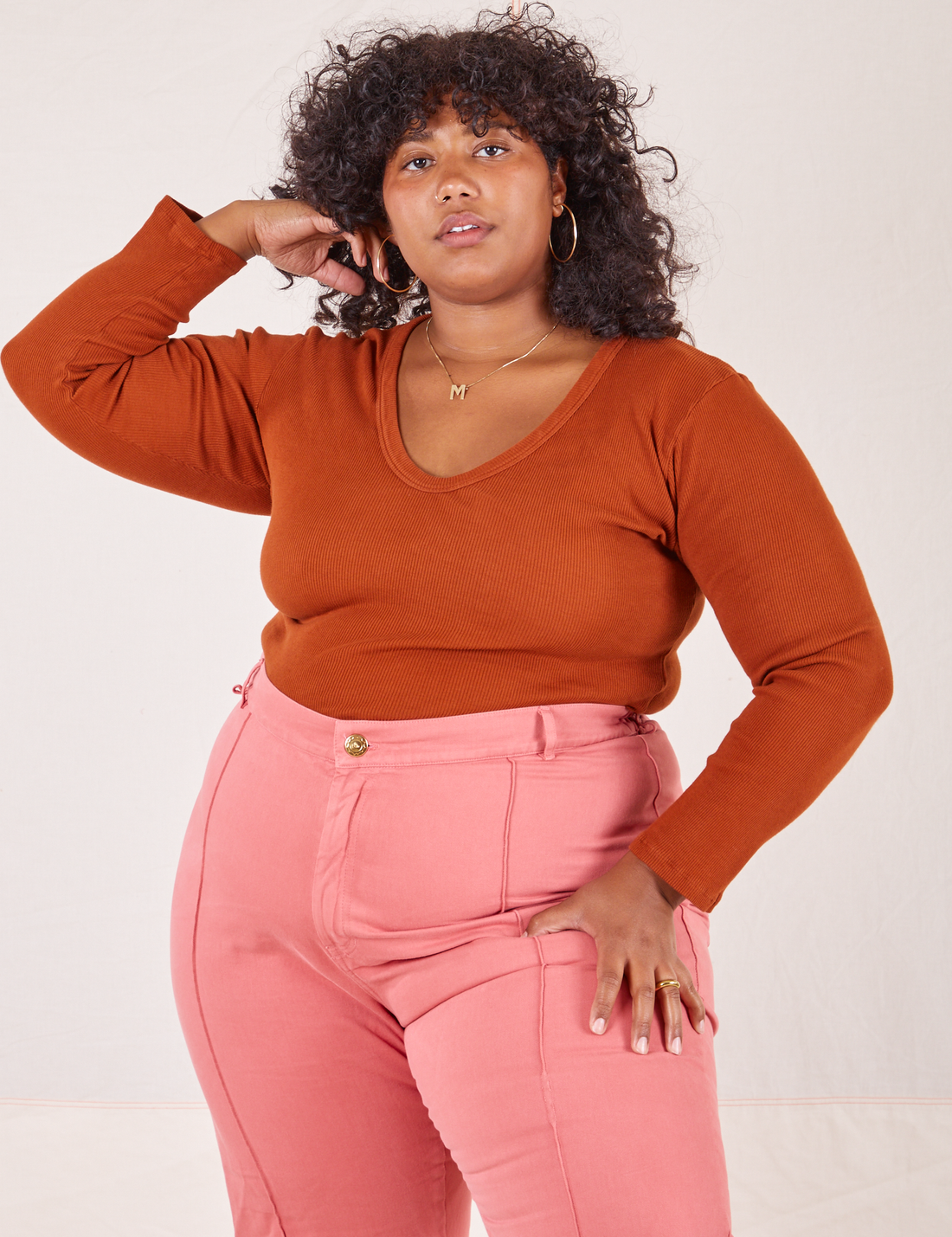Morgan is wearing size XL Long Sleeve V-Neck Tee in Burnt Terracotta