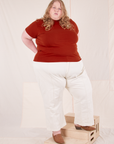 Catie is wearing Organic Vintage Tee in Paprika and vintage off-white Western Pants