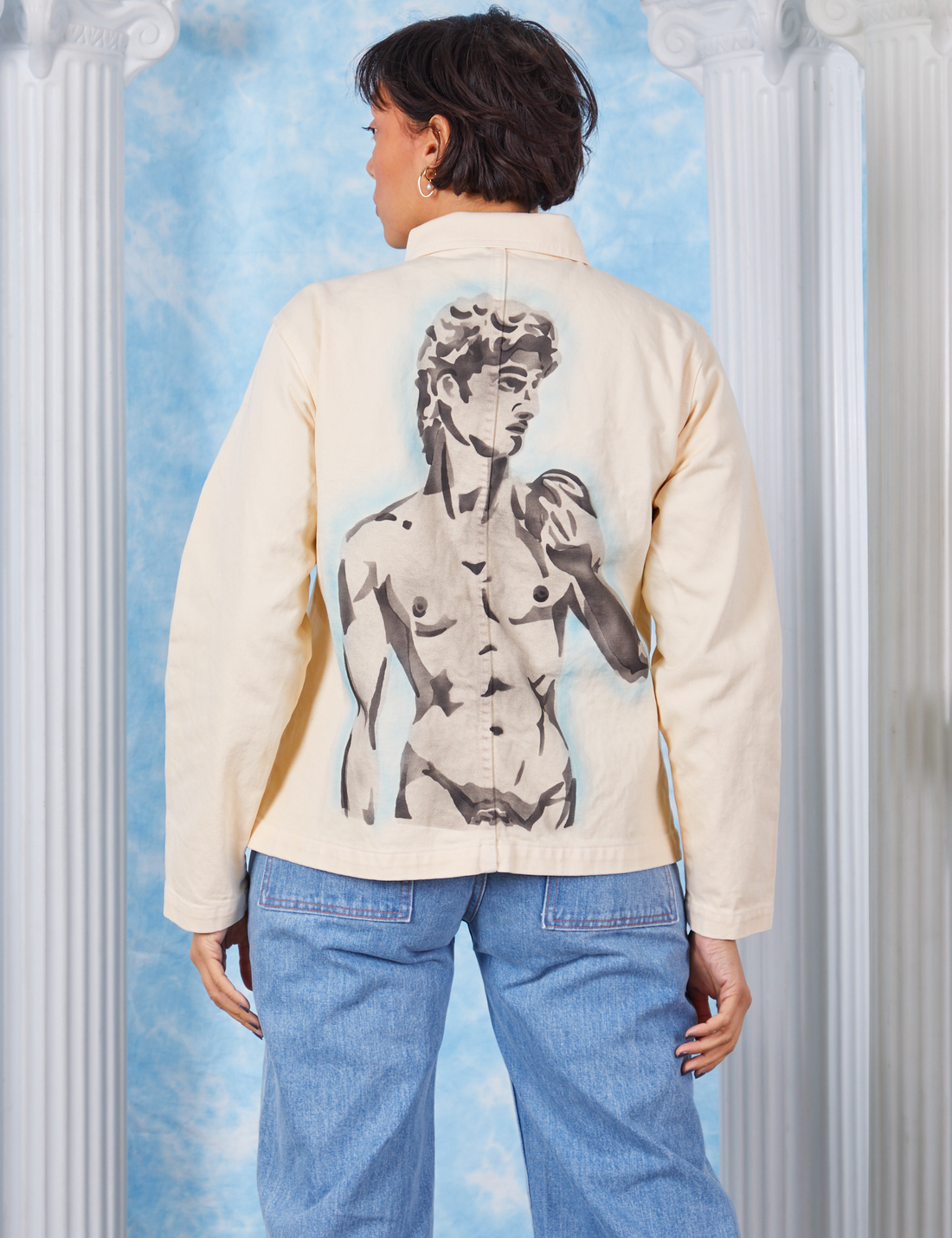 Vintage off-white Neoclassical Work Jacket worn by Tiara back view featuring airbrushed Statue of David