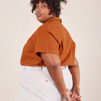 Pantry Button-Up in Burnt Terracotta side view on Morgan wearing vintage off-white Western Pants