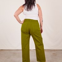 Work Pants in Olive Green back view on Faye wearing vintage off-white Tank Top