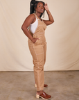 Side view of Original Overalls in Tan worn by Shai