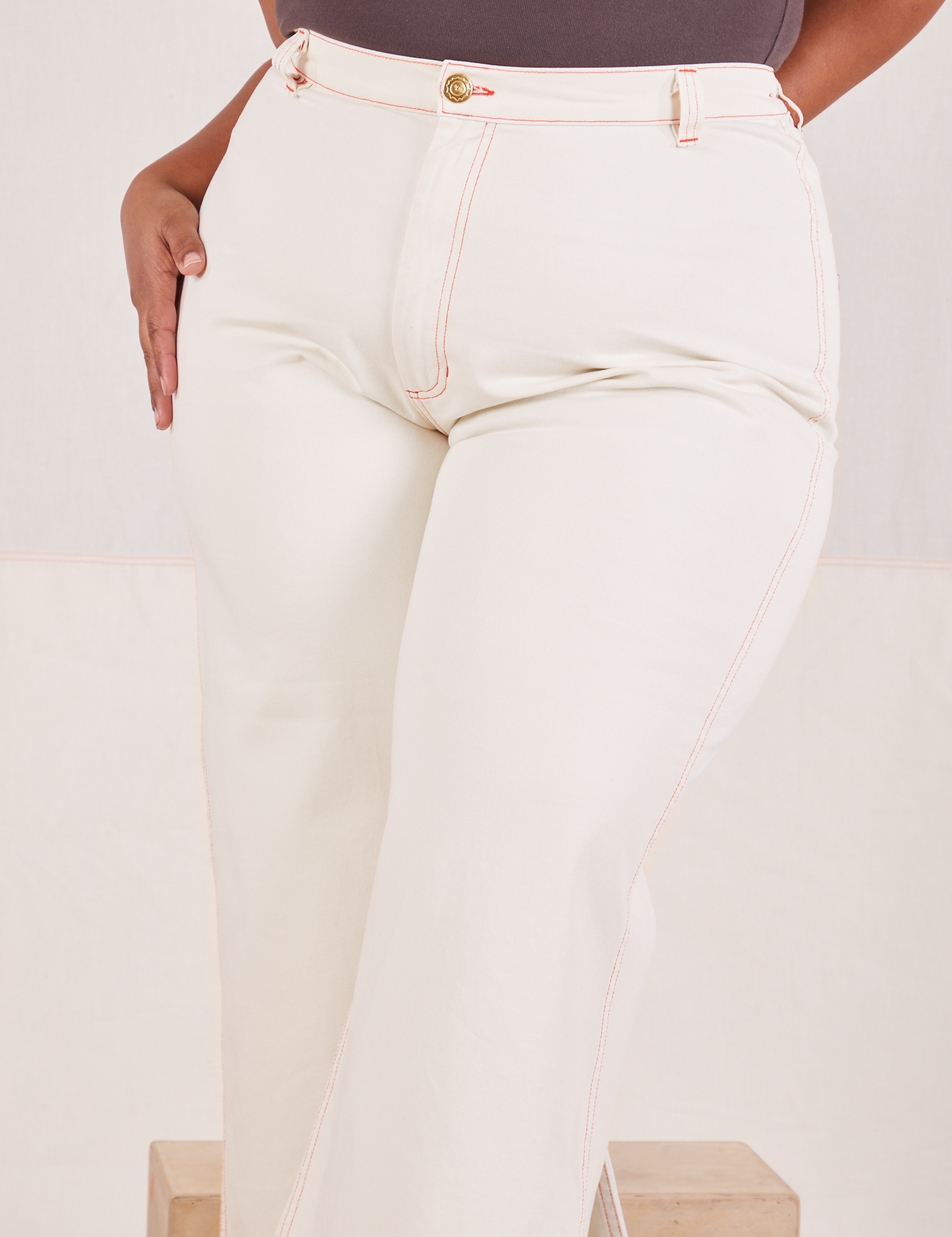 Front close up of Bell Bottoms in Vintage Off-White worn by Morgan