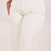 Front close up of Bell Bottoms in Vintage Off-White worn by Morgan