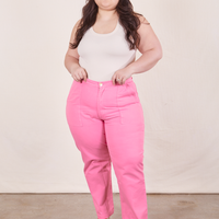 Ashley is 5'7" and wearing 1XL Work Pants in Bubblegum Pink paired with vintage off-white Tank Top