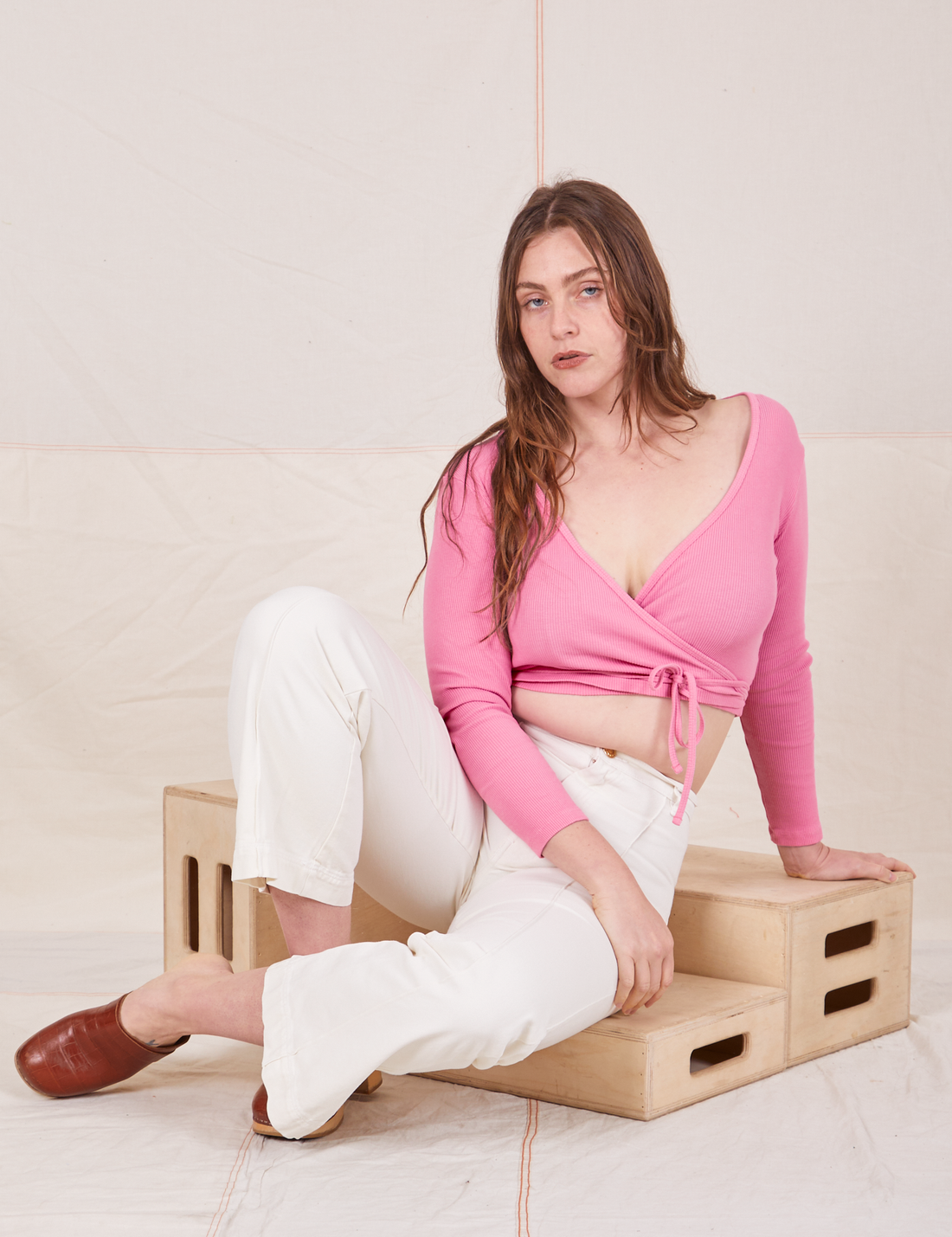 Wrap Top in Bubblegum Pink on Allison wearing vintage off-white Western Pants