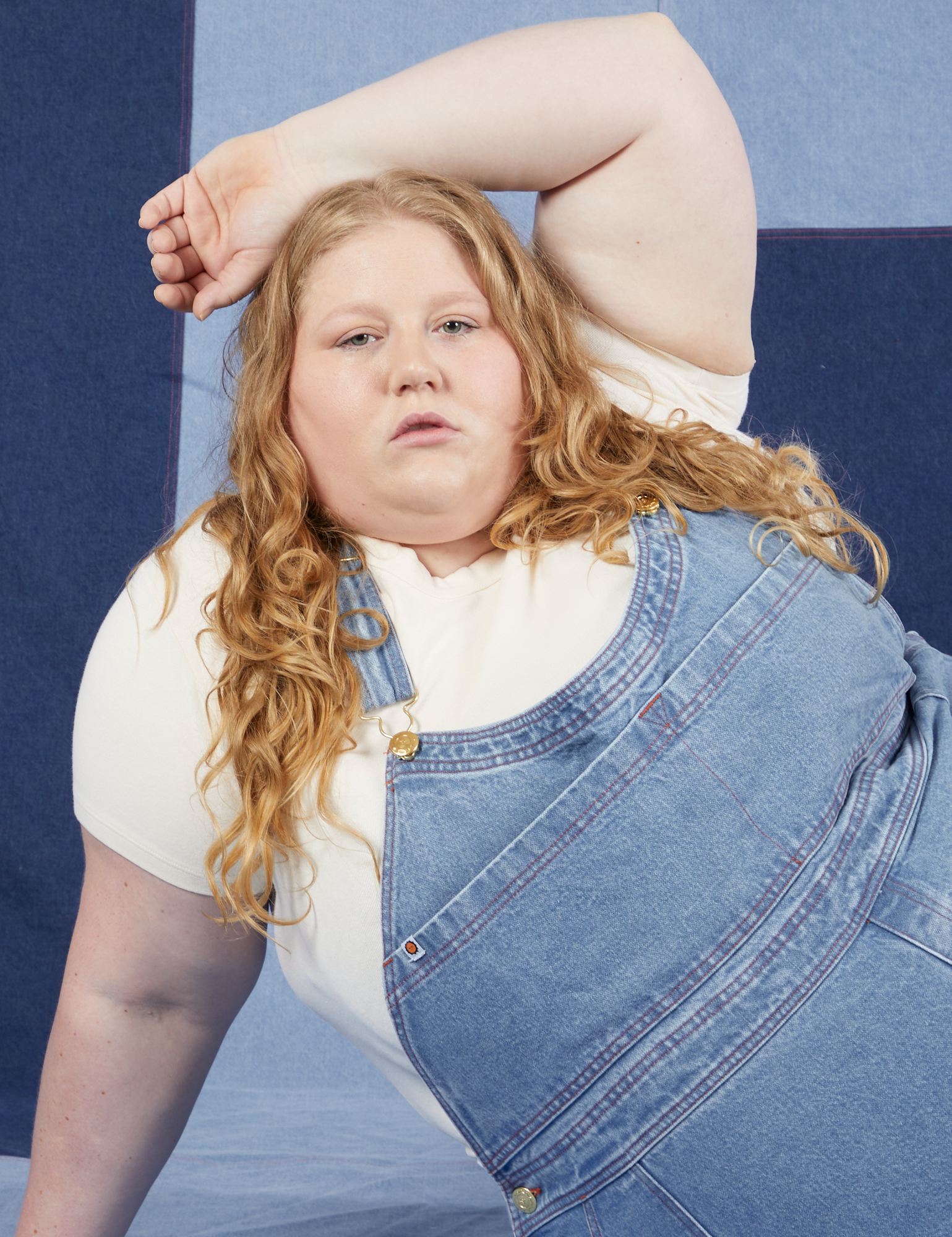 Indigo Denim Original Overalls in Light Wash on Catie wearing vintage off-white Baby Tee