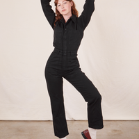 Alex is wearing Everyday Jumpsuit in Basic Black