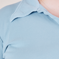 Front close up of Long Sleeve Fisherman Polo in Baby Blue worn by Catie