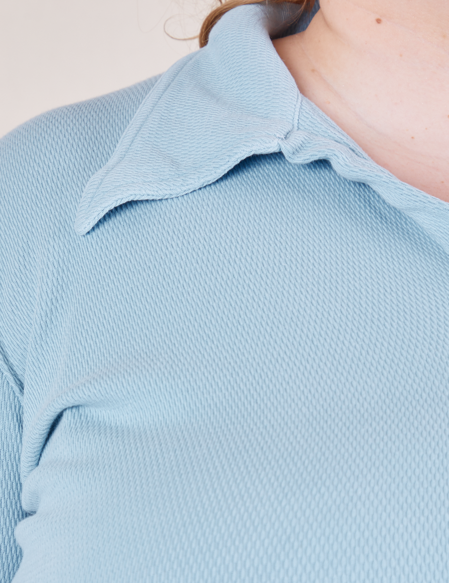 Long Sleeve Fisherman Polo in Baby Blue front close up on Catie