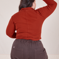 Long Sleeve Fisherman Polo in Paprika back view on Ashley wearing espresso brown Western Pants
