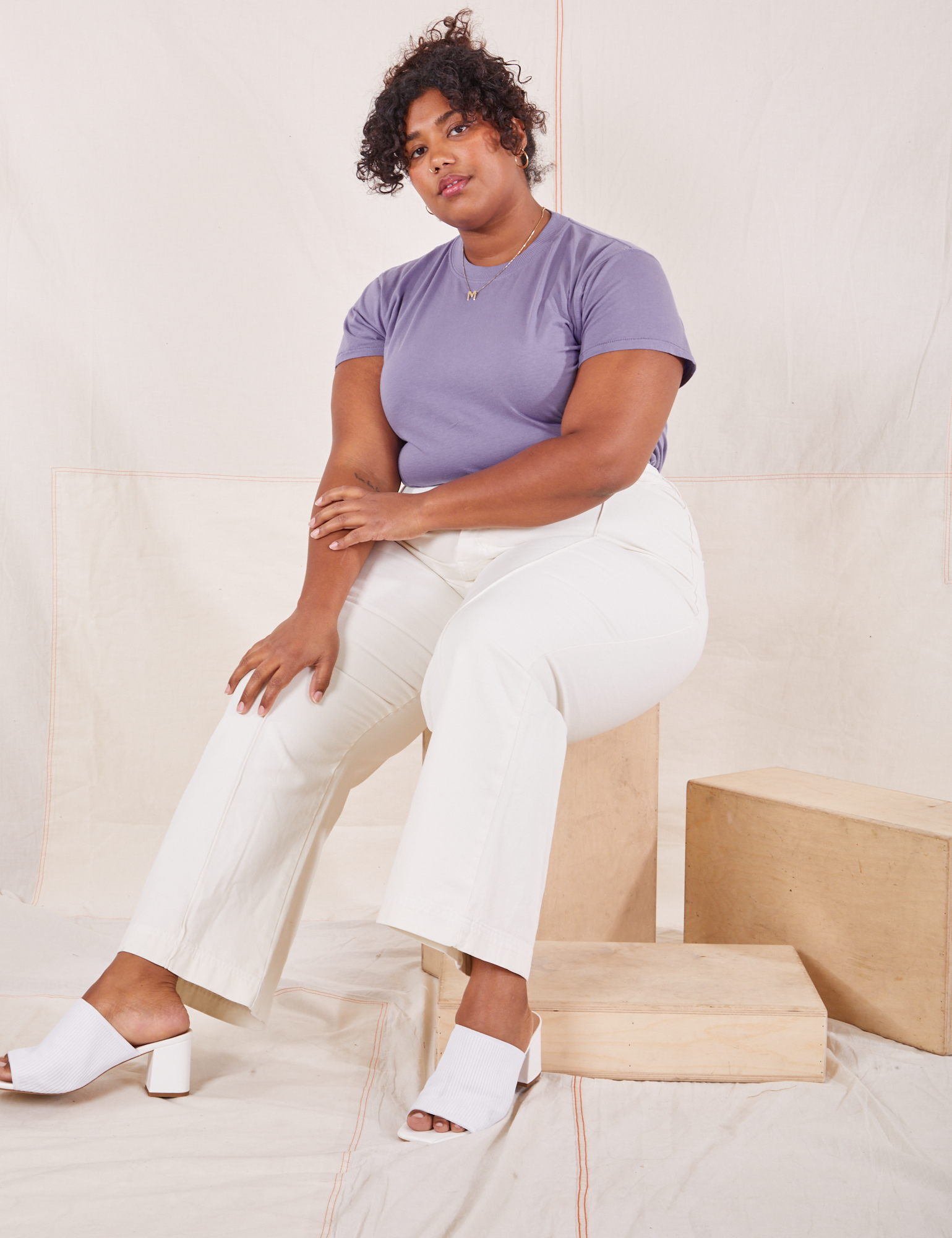 Morgan is wearing Organic Vintage Tee in Faded Grape and vintage off-white Western Pants