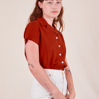 Pantry Button-Up in Paprika side view on Alex wearing vintage off-white Western Pants