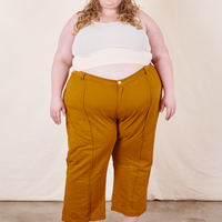 Western Pants in Spicy Mustard on Catie wearing vintage off-white Tank Top