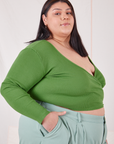 Wrap Top in Bright Olive angled view on Sarita