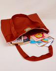XL Zip Tote in Paprika with books and folders inside