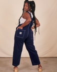 Back view of Original Overalls in Navy Blue worn by Shai