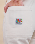 Original Overalls in Vintage Off-White back pocket with artist togs label