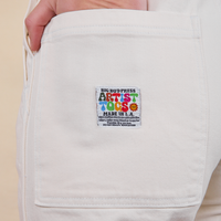 Original Overalls in Vintage Off-White back pocket with artist togs label