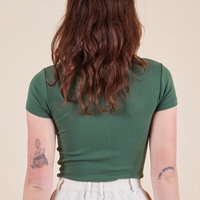 Back view of Baby Tee in Dark Emerald Green on Alex