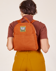 Mini Backpack in Burnt Terracotta worn by Tiara