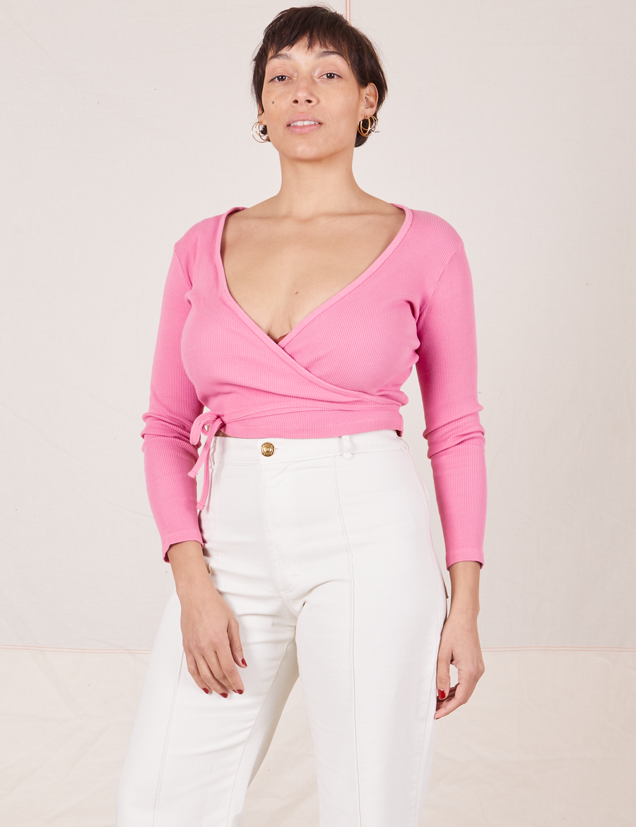 Tiara is wearing size 2 Wrap Top in Bubblegum Pink paired with vintage off-white Western Pants