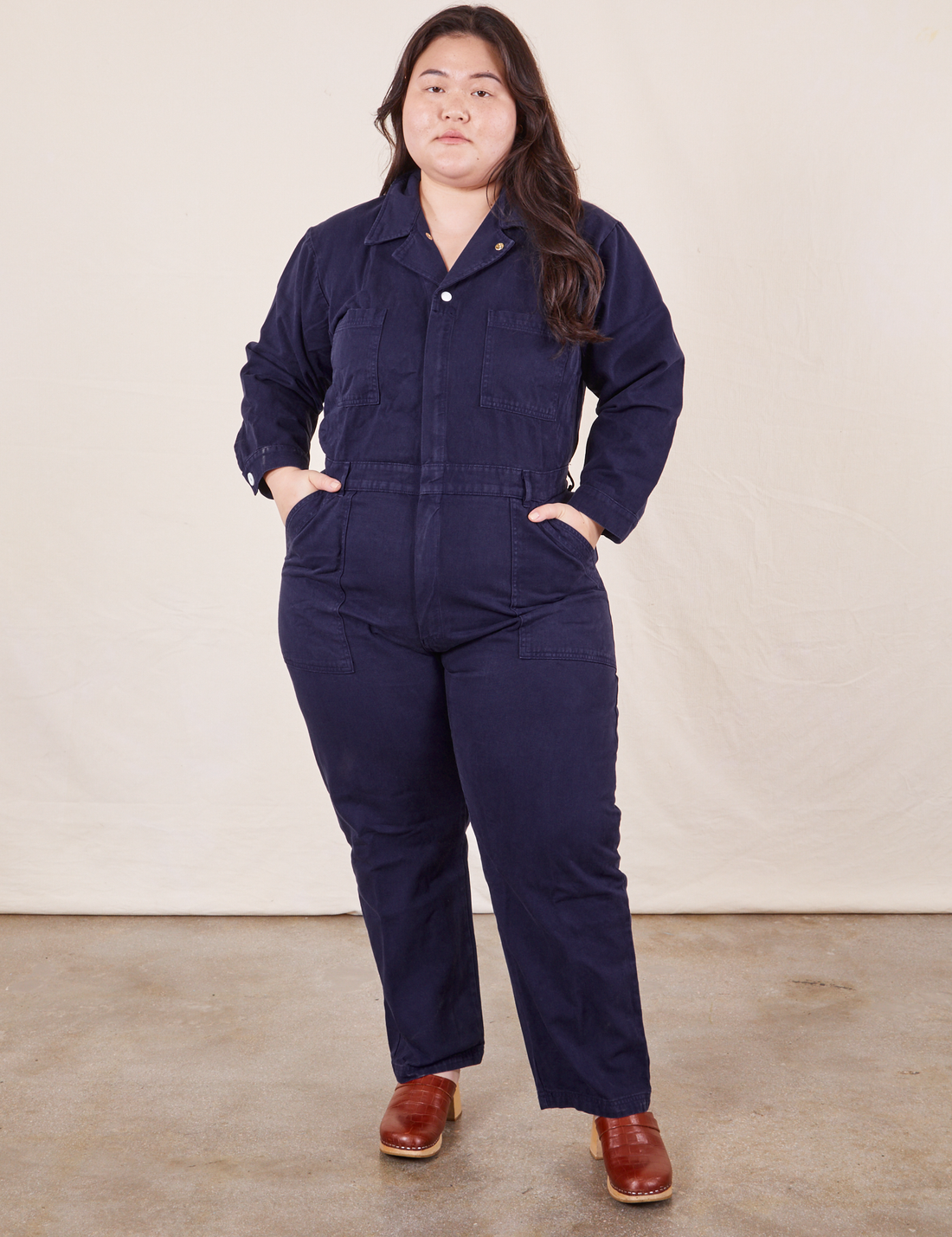 Ashley is 5'7" and wearing 1XL Everyday Jumpsuit in Navy Blue