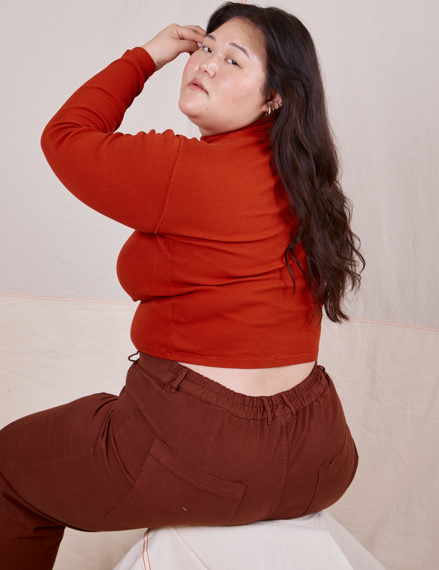 Back view of Essential Turtleneck in Paprika worn by Ashley