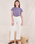 Alex is wearing P Organic Vintage Tee in Faded Grape paired with vintage off-white Western Pants