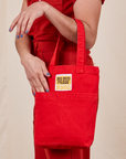 Mini Tote Bags in Mustang Red on model