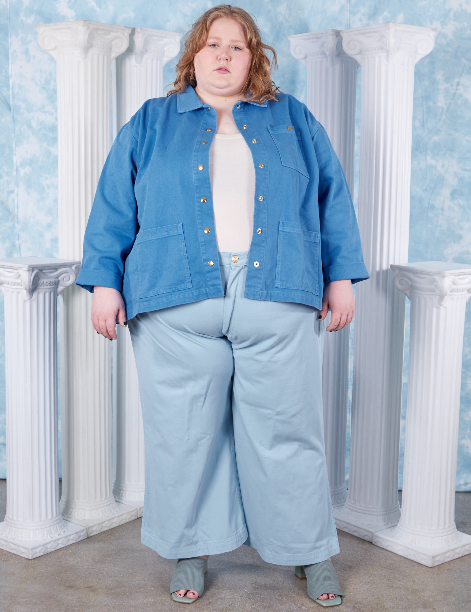 Neoclassical Work Jacket in Blue Venus on Catie wearing vintage off-white Tank Top and baby blue Bell Bottoms