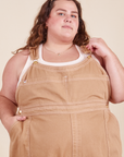 Mara is 5'5" and wearing 4XL Original Overalls in Tan