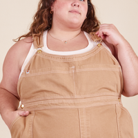 Mara is 5'5" and wearing 4XL Original Overalls in Tan