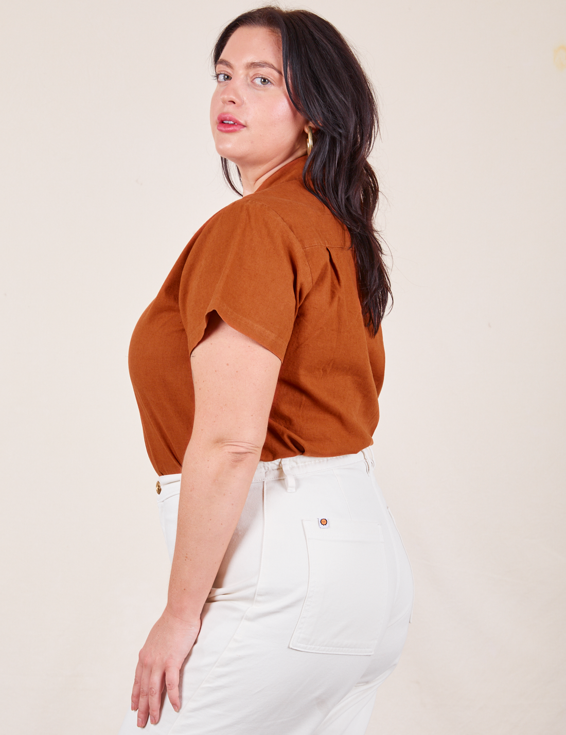 Side view of Pantry Button-Up in Burnt Terracotta worn by Faye