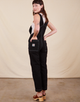 Back view of Original Overalls in Basic Black worn by Alex.