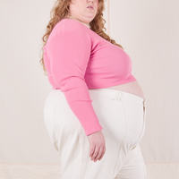 Side view of Long Sleeve V-Neck Tee in Bubblegum Pink worn by Catie