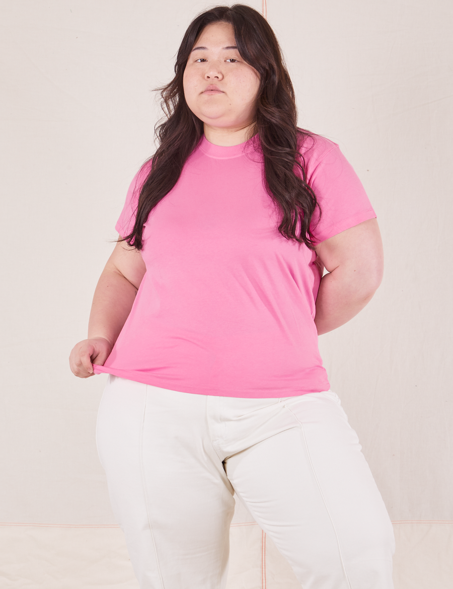 Ashley is wearing L Organic Vintage Tee in Bubblegum Pink paired with vintage off-white Western Pants