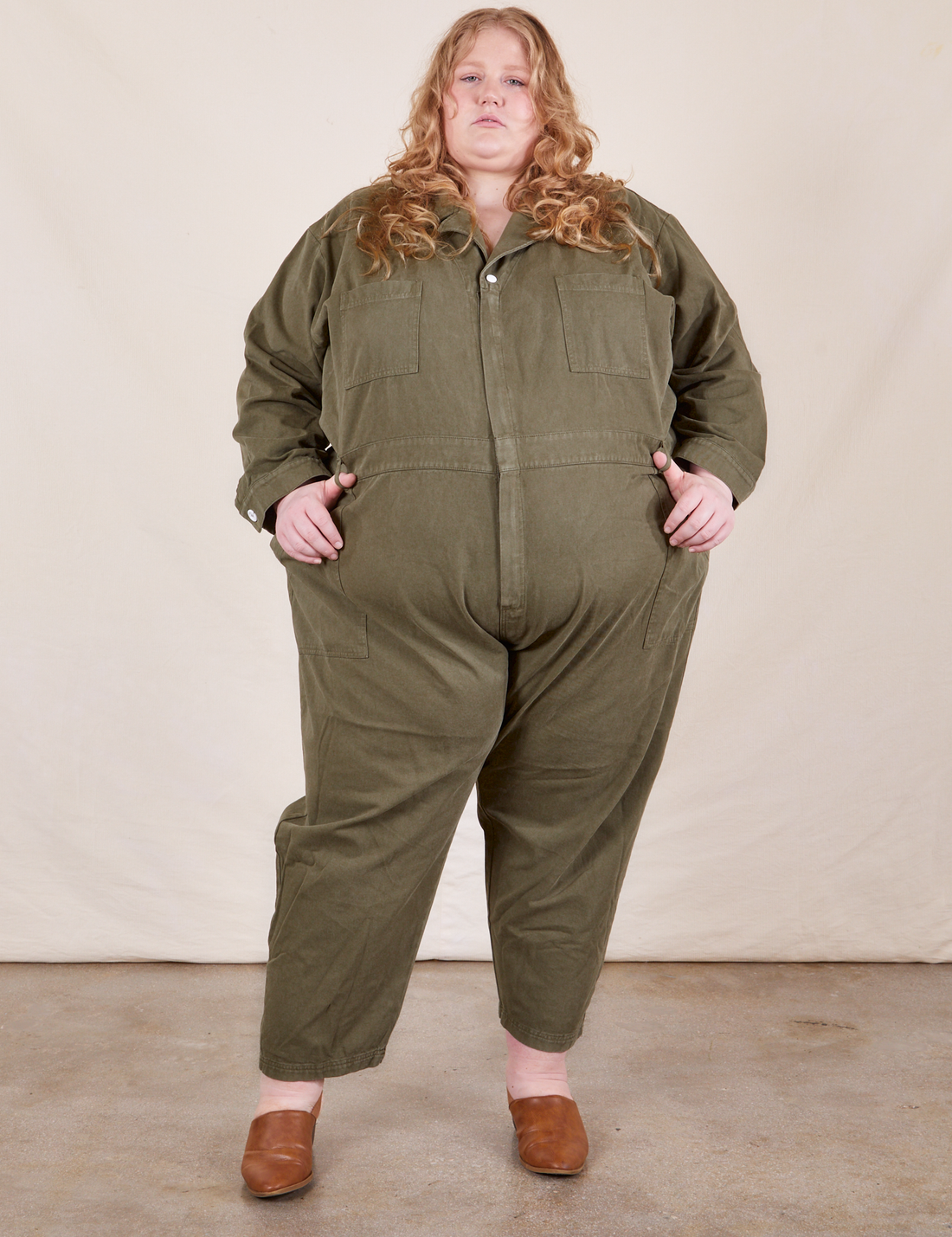 Catie is 5'11" and wearing 5XL Everyday Jumpsuit in Surplus Green