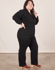 Side view of Everyday Jumpsuit in Basic Black worn by Ashley