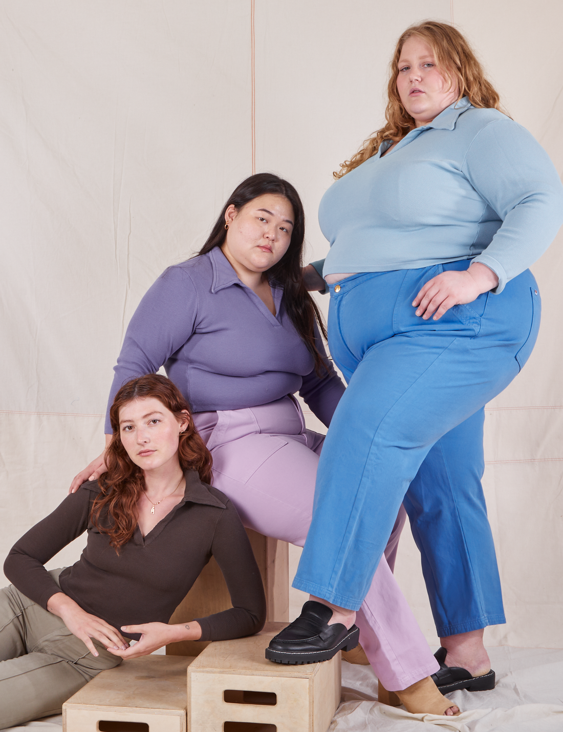 Long Sleeve Fisherman Polo group photo with Catie wearing Baby blue, Ashley wearing Faded Grape and Alex wearing Espresso Brown