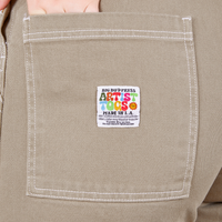 Original Overalls in Khaki Grey back pocket featuring Artist Togs label