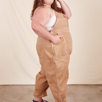 Side view of Original Overalls in Tan worn by Mara