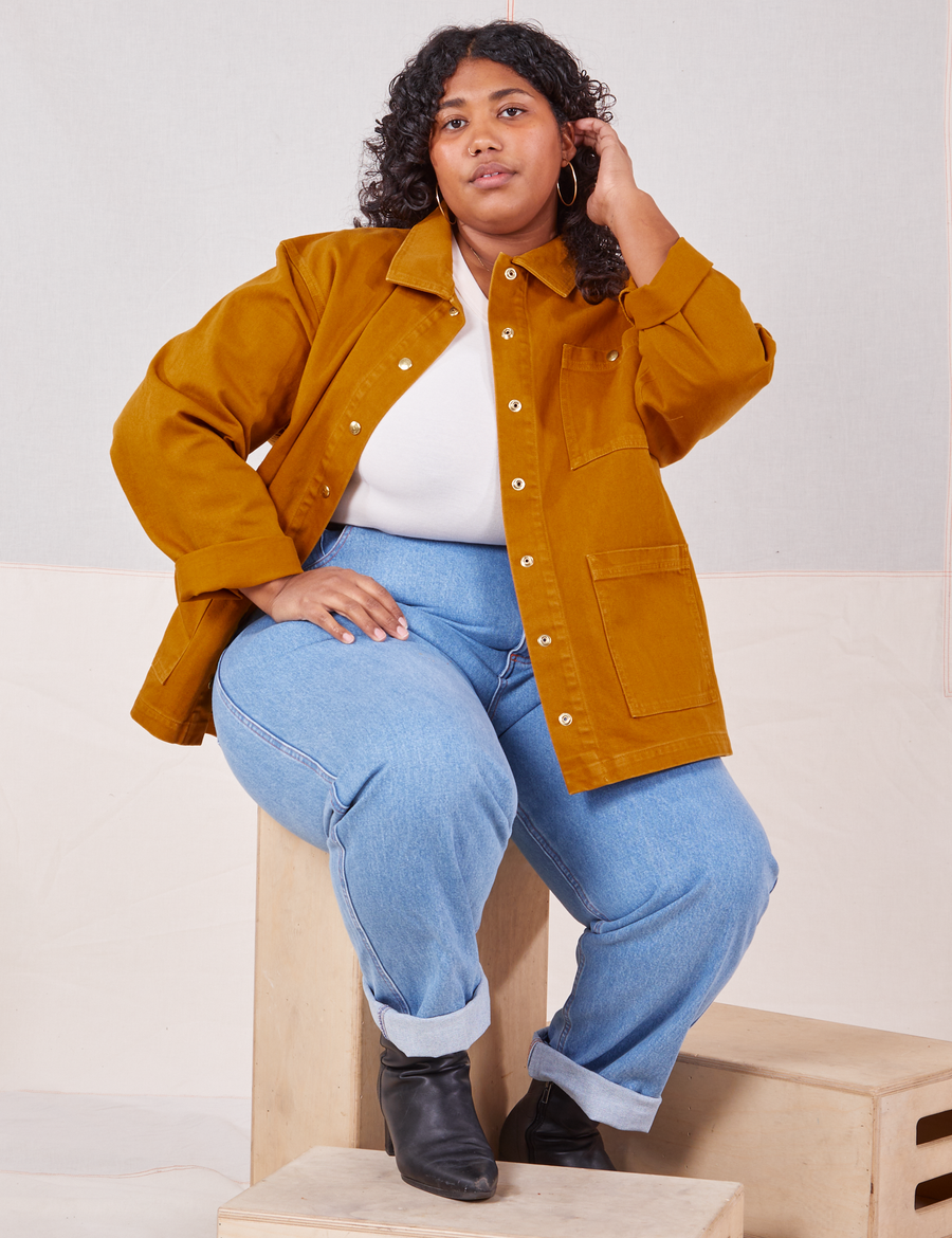 Morgan is wearing Denim Work Jacket in Spicy Mustard
