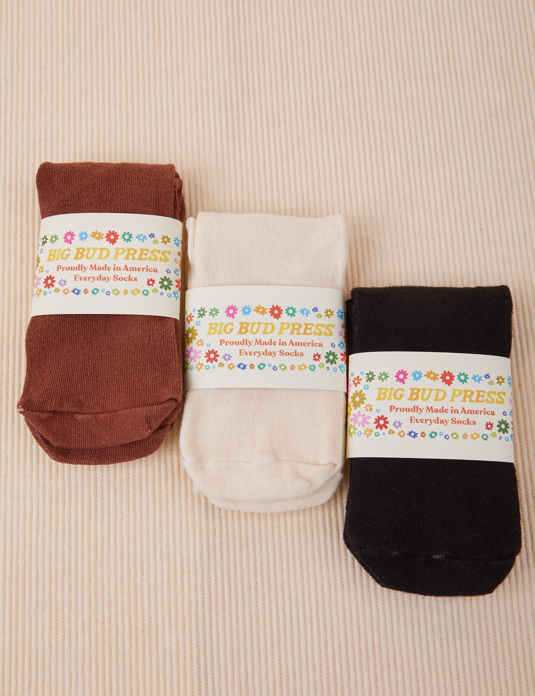 Everyday Sock in Fudgesicle Brown, Vintage Tee White and Basic Black with packaging